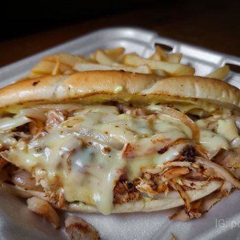El Pollon II - a chicken sandwich and french fries - Peruvian Near Me - Morgantown, West Virginia