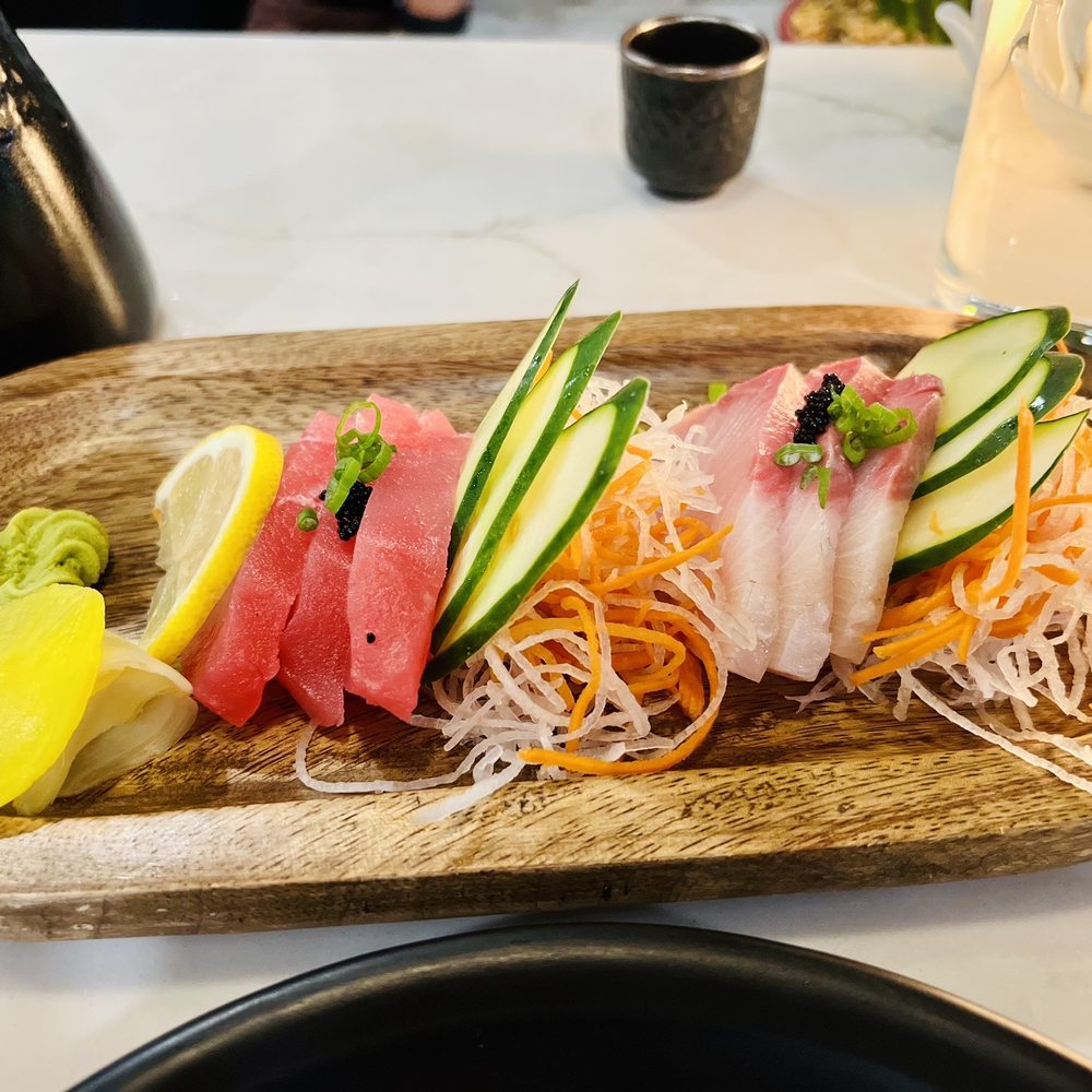 Kuma Sushi Bar - Left to right: tuna sashimi (just ok), yellowtail (pretty good!) - Sushi Bars Near Me - New Bern, North Carolina