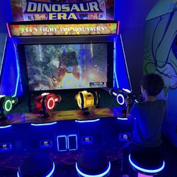 King Pin Lanes - Arcade (spray dinosaurs with water)