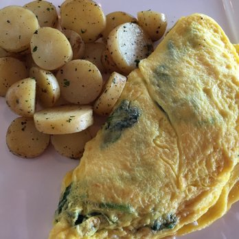 Narcoossee's - omelette with lobster, spinach, and goat cheese - New American Near Me - Lake Buena Vista, Florida Narcoossee's - omelette with lobster, spinach, and goat cheese - New American Near Me - Lake Buena Vista, Florida
