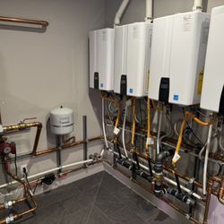 Major League Plumbing - Tankless water heaters with holding tank.