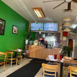 Pho Quan Viet Cuisine - Counter with menu