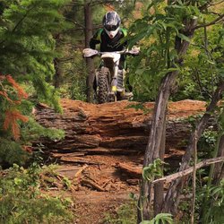 Oregon Motorcycle Rental - Practicing log-jumping techniques