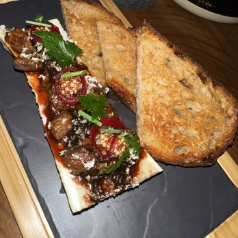 Niku Steakhouse - Bone marrow topped with beef ribs cubes. Sourdough toast - Japanese Near Me - San Francisco, California Niku Steakhouse - Bone marrow topped with beef ribs cubes. Sourdough toast - Japanese Near Me - San Francisco, California