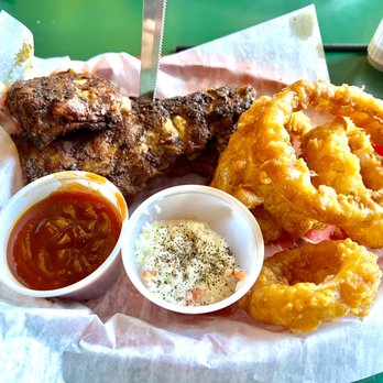 The Antler's - Dry rubbed baby back ribs with sauce on the side, onion rings and Cole slaw - Steakhouses Near Me - Sault Sainte Marie, Michigan The Antler's - Dry rubbed baby back ribs with sauce on the side, onion rings and Cole slaw - Steakhouses Near Me - Sault Sainte Marie, Michigan