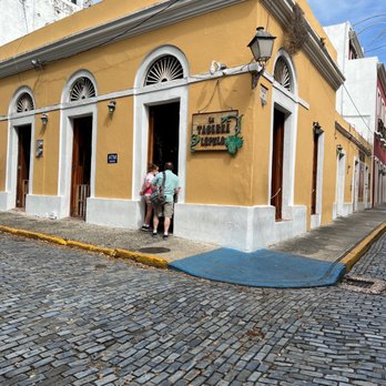 La Taberna Lúpulo - two people sitting outside a building - Breakfast & Brunch Near Me - San Juan, Puerto Rico