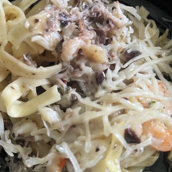 The Dead Fish - Spicy Alfredo with shrimp and crab. I added Parmesan cheese on my left overs for lunch. There are no red chili flakes. - Seafood Near Me - Crockett, California