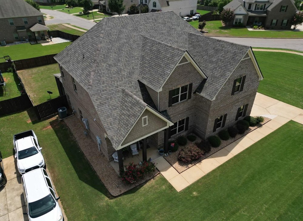 Slide of All Slopes Roofing