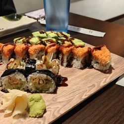 Izumi Sushi & Hibachi All You Can Eat - The red ones are the "yummy yummy" the black ones are the "spider sushi" and the green ones are "avocado".