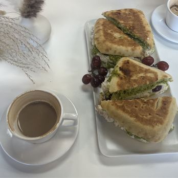 Lucy Coffee House - Sonoma chicken panini and coffee mocha - Coffee Roasteries Near Me - Aurora, Colorado