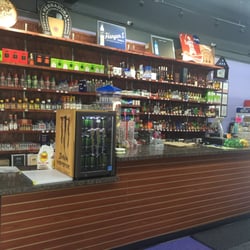 Happy Hour Wine & Spirits - Clean, warm, and welcoming environment.