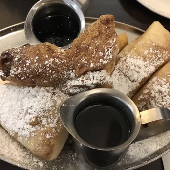 Syrup Downtown - Beignets with blackberry and butterscotch syrup - Breakfast & Brunch Near Me - Denver, Colorado Syrup Downtown - Beignets with blackberry and butterscotch syrup - Breakfast & Brunch Near Me - Denver, Colorado