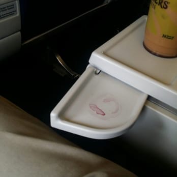 Sun Country Airlines - Wine stains from previous flight in first class, classy... - Airlines Near Me - Eagan, Minnesota