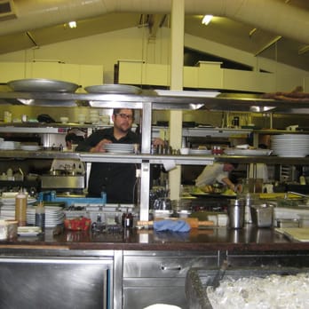 Windows On the Water - a peek into their kitchen!! caught one member off guard :) - New American Near Me - Morro Bay, California Windows On the Water - a peek into their kitchen!! caught one member off guard :) - New American Near Me - Morro Bay, California