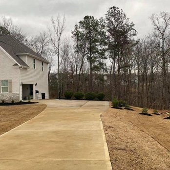 Semper Fi Lawn Care & Landscaping - a driveway in front of a house - Tree Services Near Me Semper Fi Lawn Care & Landscaping - a driveway in front of a house - Tree Services Near Me