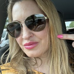 Capitol Hair Salon - This is where she burnt my hair with her flat iron that is supposed to be silver but is that disgusting orange rust color