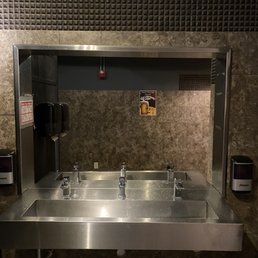 a stainless steel public restroom a stainless steel public restroom