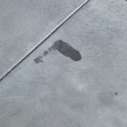 Transmission line leakage on driveway.
