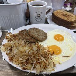 Mateo’s cafe and Restaurant - Two eggs, sausage patty, hashbrowns and rye toast.