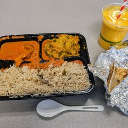 The Curry Club - Butter chicken, spicy chicken, mango drink, naan bread
