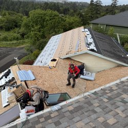 Klaus Roofing Systems of Oregon - In-progress roof installation with Klaus Roofing Systems of Oregon on the coast
