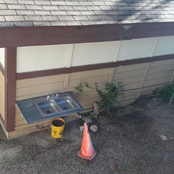 Timberline Lodge - There is a sink for unknown purposes and this area was downstairs outside our door and bedroom window. Stunk like fesces - Hotels Near Me - Big Bear Lake, California