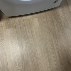 Scharm Floor Covering - Scharm team moved washer and dryer to install luxury vinyl flooring