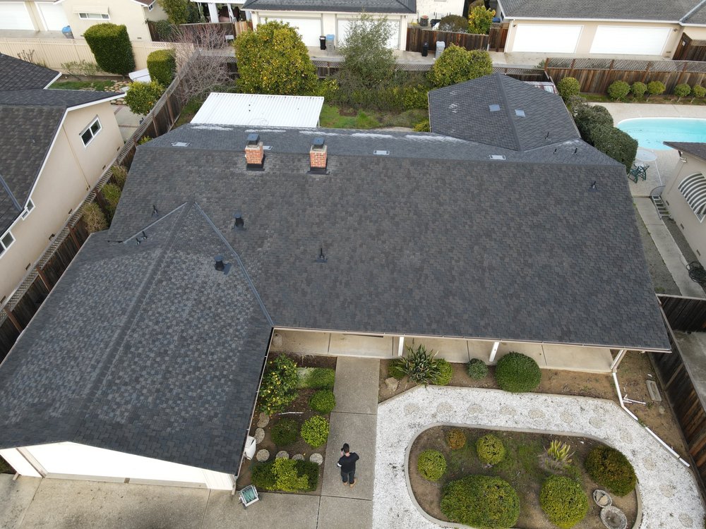 Slide of ELM Roofing Contractors