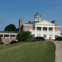 The main clubhouse from the back approaching from the 9th hole