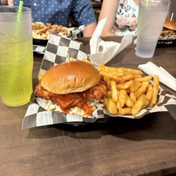 Parlay Sports Bar - Crispy chicken sandwich and fries with a crisp Mountain Dew.
