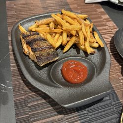Kids' menu - salmon and French fries (or salad). Simple, well seasoned.