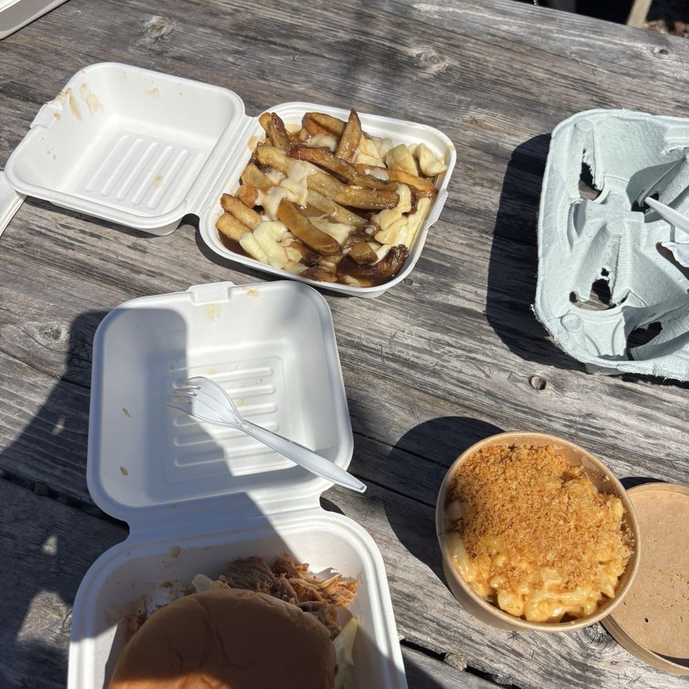Pulled pork sandwich, poutine and macaroni and cheese. Pulled pork sandwich, poutine and macaroni and cheese.