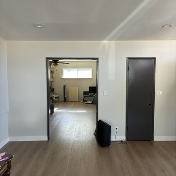 Andy’s Painting - Painted Walls, baseboards and door - Painters Near Me