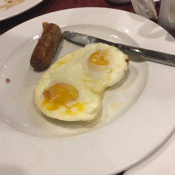 Cafe Aquarius - We ordered sunny side up egg but gave my husband this egg - Cafes Near Me - Laughlin, Nevada