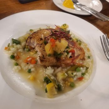 The Station - Grilled sword fish w risotto and pineapple salsa...very bland and sword fish over cooked - New American Near Me - Naugatuck, Connecticut