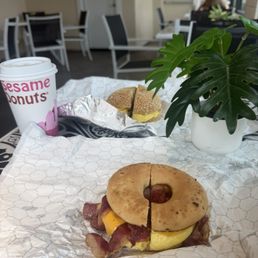 Maple Sausage Egg & Cheese sandwich on sesame bagel and gluten-free bacon, egg and cheese sandwich on everything bagel. Maple Sausage Egg & Cheese sandwich on sesame bagel and gluten-free bacon, egg and cheese sandwich on everything bagel.