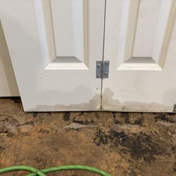 Kapura General Contractors - Mold on closet doors left behind