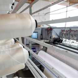 Beds By Design - Our quilting machine.