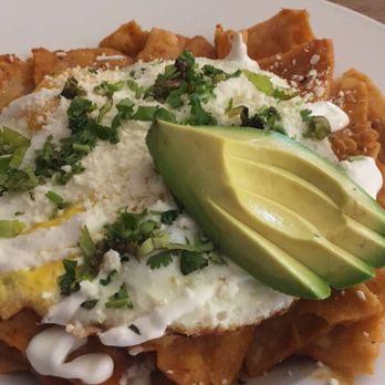 Monkey Business Cafe - Chilaquiles with sunny side eggs and avocado - Sandwiches Near Me - Fullerton, California