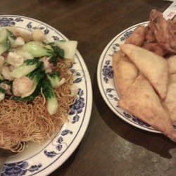 Seafood pan fried noodles, crab puffs, and fried chicken wings