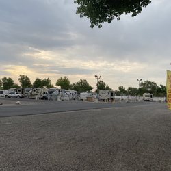 Clark RV Park - View of long term parking from grassy area by playground - which was a tire swing and 2 regular swings