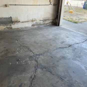 Supreme Concrete Group - Cracks in garage floor - Masonry/Concrete Near Me