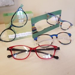 Optical Shoppe of La Plata - I am in love with this new group of gorgeous colorful frames!!! The back right is leaning on the plastic it was cut from! Beautiful product!