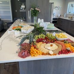 FoodAddiction Custom Catering - Grazing table with finger foods. Private residence setup/ drop off.