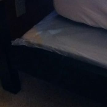 Rooms To Go - Plastic cover left on the platform support. - Furniture Stores Near Me - San Antonio, Texas