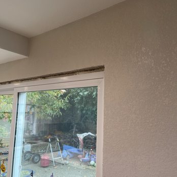 Hole In the Wall - After replacing and re-texturing water damaged drywall at header above door - Drywall Installation & Repair Near Me Hole In the Wall - After replacing and re-texturing water damaged drywall at header above door - Drywall Installation & Repair Near Me