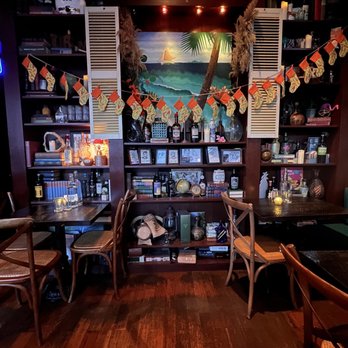Rumba - a dining room with tables and chairs - Caribbean Near Me - Seattle, Washington Rumba - a dining room with tables and chairs - Caribbean Near Me - Seattle, Washington