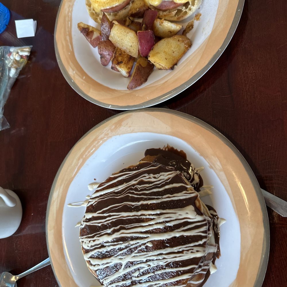 The Kitchen Table - Top eggs Benedict bottom Boston cream pancakes - American Near Me - North Myrtle Beach, South Carolina The Kitchen Table - Top eggs Benedict bottom Boston cream pancakes - American Near Me - North Myrtle Beach, South Carolina