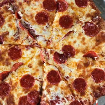 Fellini's Pizza - Sicilian pizza, big tasty crust, great tomato sauce. 1980's place and decoration, good service. - Pizza Near Me - Atlanta, Georgia