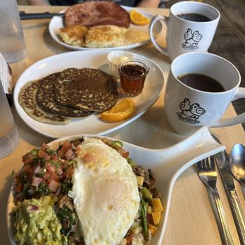 Two Chicks - From top to bottom: Ham Steak & Eggs, Sweet Potato Pancake (short stack), and Vegan Skillet with two fried eggs. - Breakfast & Brunch Near Me - Reno, Nevada Two Chicks - From top to bottom: Ham Steak & Eggs, Sweet Potato Pancake (short stack), and Vegan Skillet with two fried eggs. - Breakfast & Brunch Near Me - Reno, Nevada